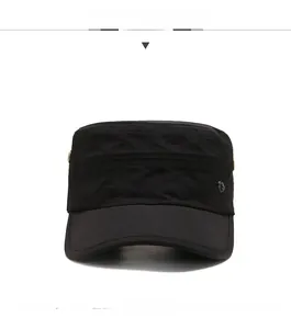 Front view of a black cotton cadet hat featuring a circular metal side decoration