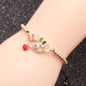 Adjustable copper bead bracelet featuring colorful evil eye and red heart charms
