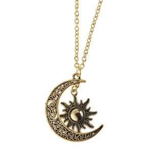 Vintage bronze sun and moon pendant necklace with intricate hollow filigree pattern