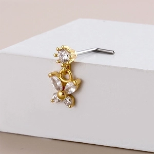 Golden butterfly zircon nose stud with L-shaped stainless steel rod on white cube