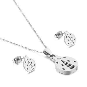 Minimalist silver ladybug jewelry set with steel necklace and stud earrings