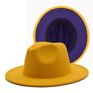 Detail view of the two-tone yellow and purple felt jazz fedora with smooth contrast lining