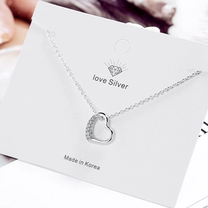 Sparkling silver open heart pendant necklace with rhinestones on delicate cable chain