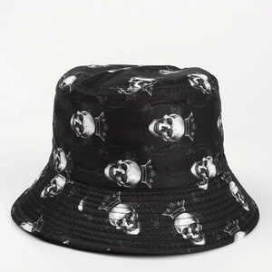 Detail of black bucket hat featuring skull and crown print with high-quality fabric texture