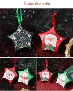 Detailed view of star-shaped Christmas candy boxes with festive ribbons and snowman patterns