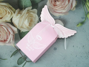Pink angel wing candy box with white ribbon and thank you text for party favors