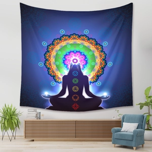 Detail of bohemian chakra meditation tapestry hanging in a modern living room