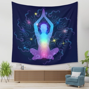Modern bohemian wall tapestry with meditation silhouette and nebula patterns in a room