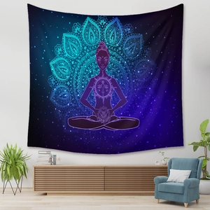 Detail of bohemian mandala tapestry featuring a meditating woman in dreamy blue and purple