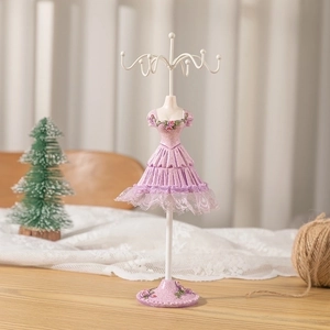 Detailed view of pink lace mannequin jewelry stand with rose relief and 6 metal top hooks