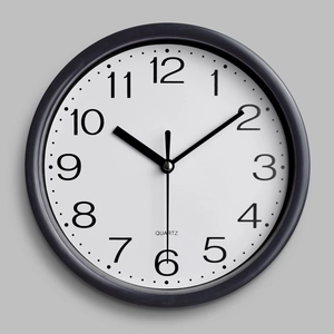 Classic 8-inch round quartz wall clock with black frame and bold Arabic numerals