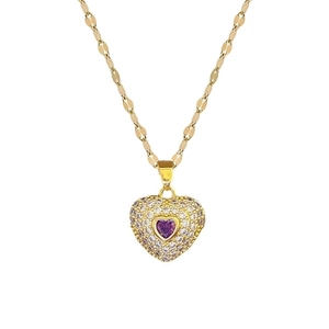 Luxury gold titanium heart necklace featuring purple gemstone and micro-pave crystals