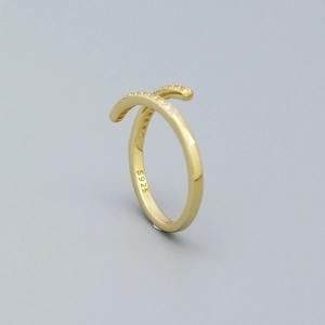 Crossed open 925 sterling silver ring with cubic zirconia in gold-plated finish
