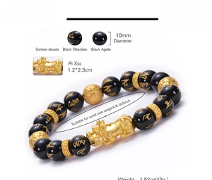 Detail view of Pixiu bracelet with 10mm obsidian beads and gold-toned feng shui charms