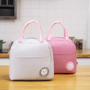 Insulated canvas lunch bags in pink and grey with round rabbit logo and zipper closure