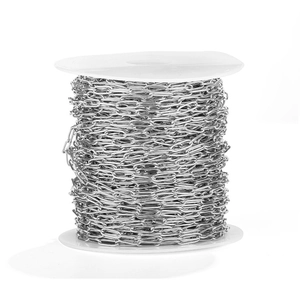 Close-up of 7mm oval stainless steel chain link on spool for DIY jewelry making