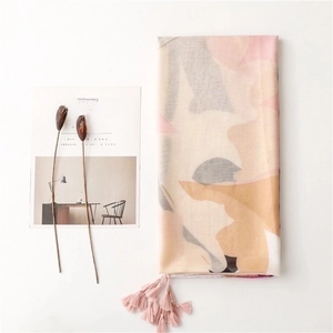 Floral cotton linen scarf with soft pink geometric pattern and decorative fringe
