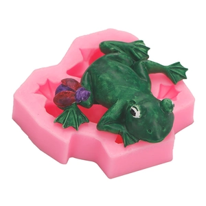 DIY frog silicone mold for resin or clay crafts with a green finished frog sample