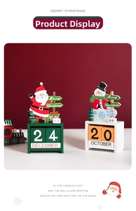 Detail of wooden Christmas countdown calendar with Santa and snowman figures