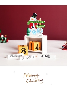 Detailed view of a wooden Christmas advent calendar with snowman blocks and festive decor