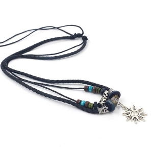 Ethnic sun pendant necklace with black braided cord and colorful assorted beads