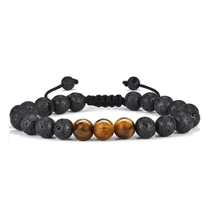 Close-up of 8mm tiger eye and lava stone beaded bracelet with black woven cord