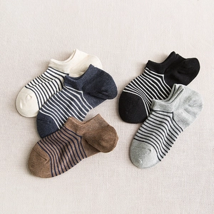 Five pairs of men's low cut striped boat socks in beige navy brown black and grey