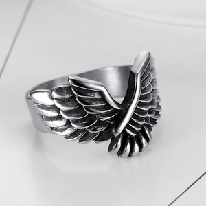 Vintage stainless steel eagle wing ring for men with detailed feather engraving in retro style