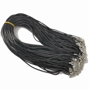 Detail of bulk black waxed cotton necklace cords with silver lobster clasps and extenders