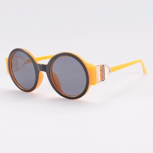 Modern round full-frame sunglasses with black front, bright orange temples and gold accents