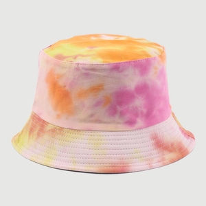 Detailed stitching and tie-dye texture on a vibrant cotton canvas bucket hat