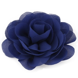Detailed top view of dark blue chiffon flower hair clip with realistic fabric texture