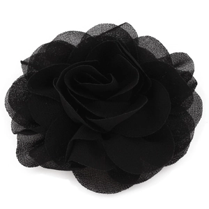 Close-up of the black chiffon rose hair clip showing layered fabric texture and petals
