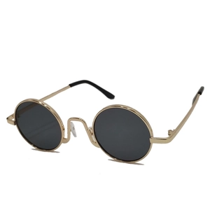 Detail shot of vintage small round metal sunglasses frame with dark polarized lenses
