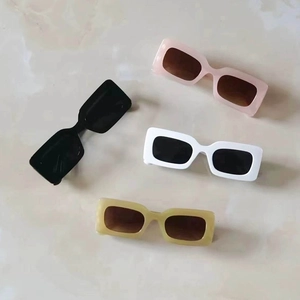 Retro square thick frame sunglasses in black, white, and pink for a trendy vintage look