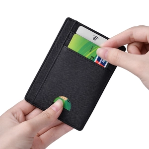 Detailed view of black Saffiano leather RFID card holder showing easy card retrieval