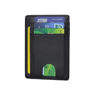Vertical RFID black pebbled leather card holder featuring three slots and thumb slide hole