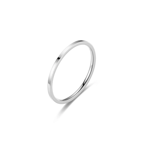 Macro shot of minimalist silver titanium steel ring with thin flat band structure