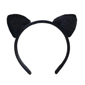 Detailed view of cute black fuzzy cat ear headband with soft plush velvet texture