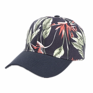 Adjustable baseball cap with tropical bird of paradise floral print and navy blue visor
