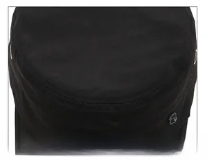 Detail of double-stitching and metal buckle on a black military flat top sun hat