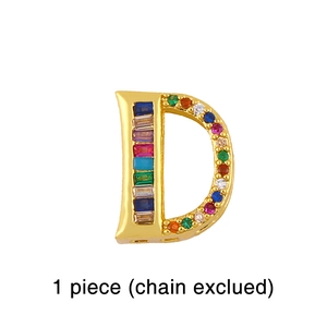 Detail of gold letter D charm with vibrant multi-color zircons for mesh band DIY
