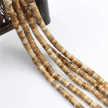 Macro shot of natural brown and beige stone spacer beads for DIY jewelry making