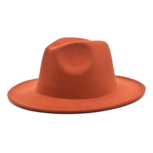 Detail view of the high-quality orange wool fedora hat with wide brim and classic crown
