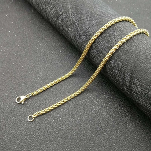 Polished gold vacuum-plated wheat link chain with a secure lobster clasp and fine texture