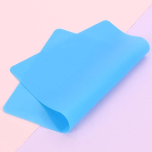 Close-up of flexible blue silicone mat for DIY resin crafts and heat resistant baking