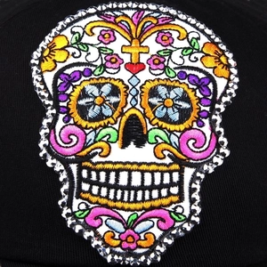 Black baseball cap featuring colorful sugar skull embroidery and sparkling rhinestones
