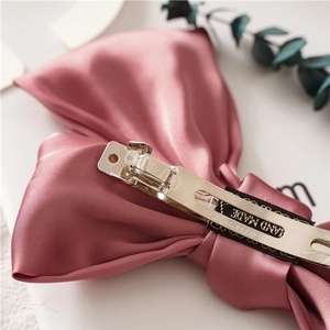 Elegant dusty rose satin double bow hair clip with handmade metal spring clamp