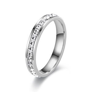 Detailed close-up of eternity band with princess cut zircon and channel setting