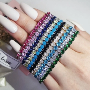Sparkling tennis bracelets with colorful round-cut cubic zirconia on a wrist